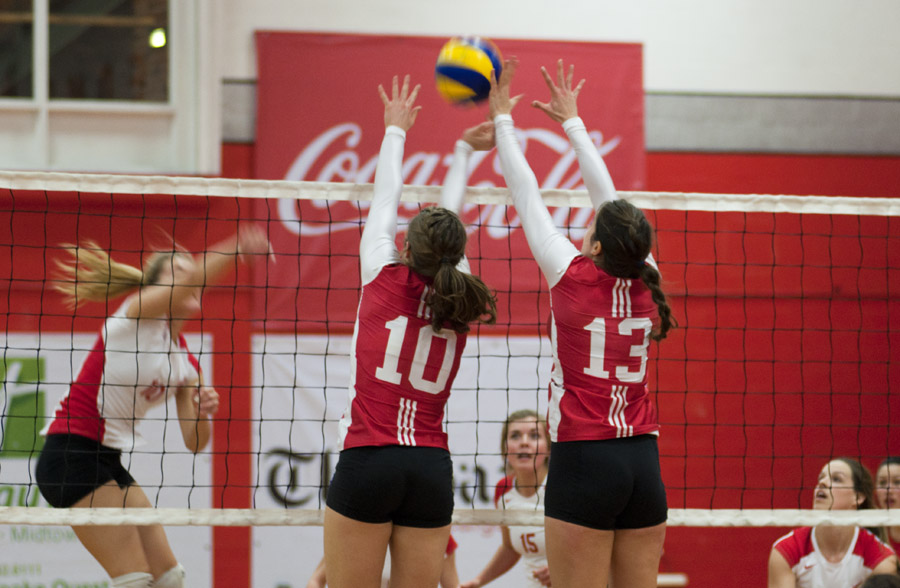 Plante and Hébert rise for the block against Memorial. (Simon Poitrimolt / McGill Tribune)